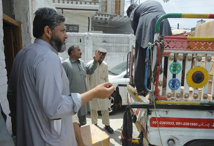 Unloading Hoopoe Books in Pakistan