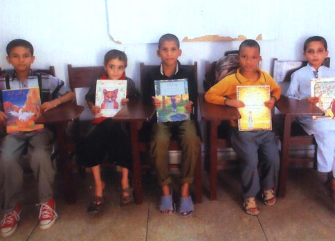 Boys with Hoopoe books from the Edhi Foundation