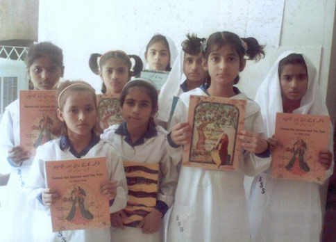 Girls with Hoopoe books from the Edhi Foundation