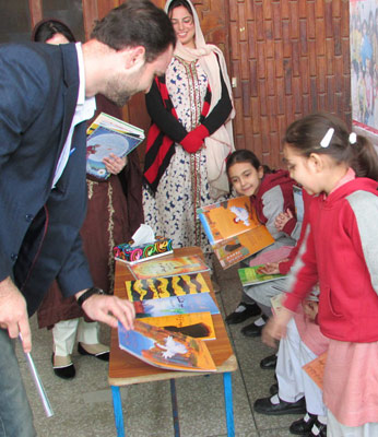 Handing out Hoopoe books for International Book Giving Day
