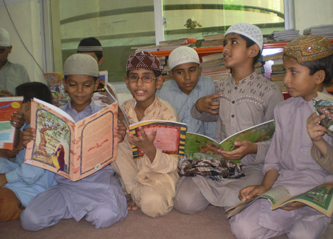 Pakistani boys enjoying Hoopoe Books
